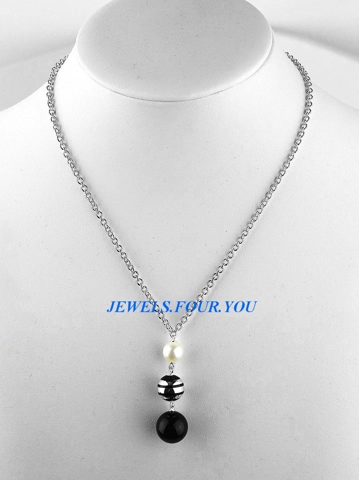 MONTBLANC STERLING SILVER 9mm AKOYA PEARL ONYX RESIN NECKLACE GERMANY 38515: MONTBLANCFINE JEWELRY COLLECTION NECKLACE.925 STERLING SILVER CREAM, 9mm AKOYA PEARLBLACK ONYX, 14mmTHREE RINGS MOTIF BLACK RESIN, 11mmCHAIN: 17" LongTotal Length: 10 3/4" (Flat: 3 pendant balls + cha