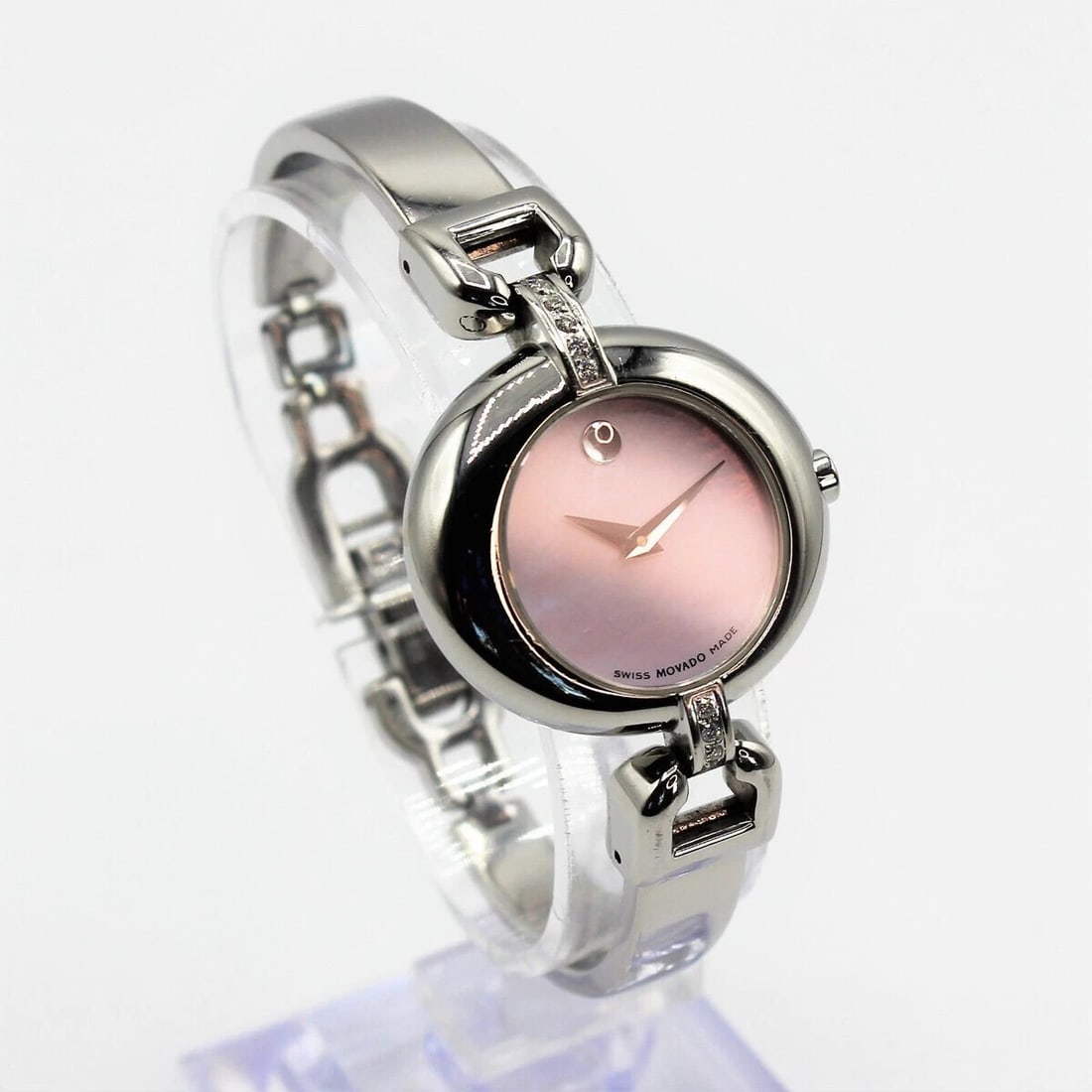 Movado Vivo Diamond MOP Pink Dial Silver Bangle Women's Swiss Watch: Movado "Vivo" Ladies Wristwatch 27mm stainless steel, RARE PINK MOTHER OF PEARL dial with Diamond Mounts #49with stainless-toned dot and hands, stainless steel double-bar bangle-style braceletArt Deco