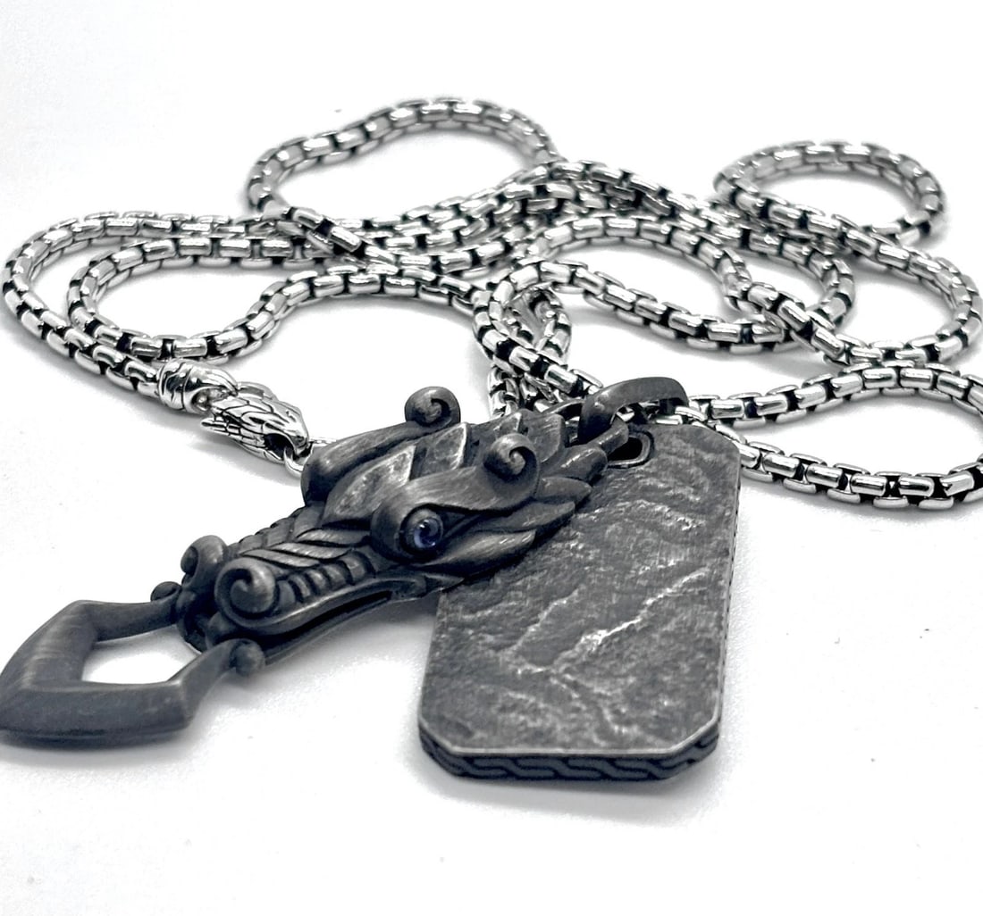 JOHN HARDY Reticulated Silver Pendant with Blue Sapphire Eyes Box Chain #97A: John Hardy presents Dog Tag/Pendant Legend Naga with Blue Sapphire Eyes on Sterling Silver 26" Box Chain #97AElevate your style with the John Hardy Legends Naga Reticulated Silver Pendant. This stunni