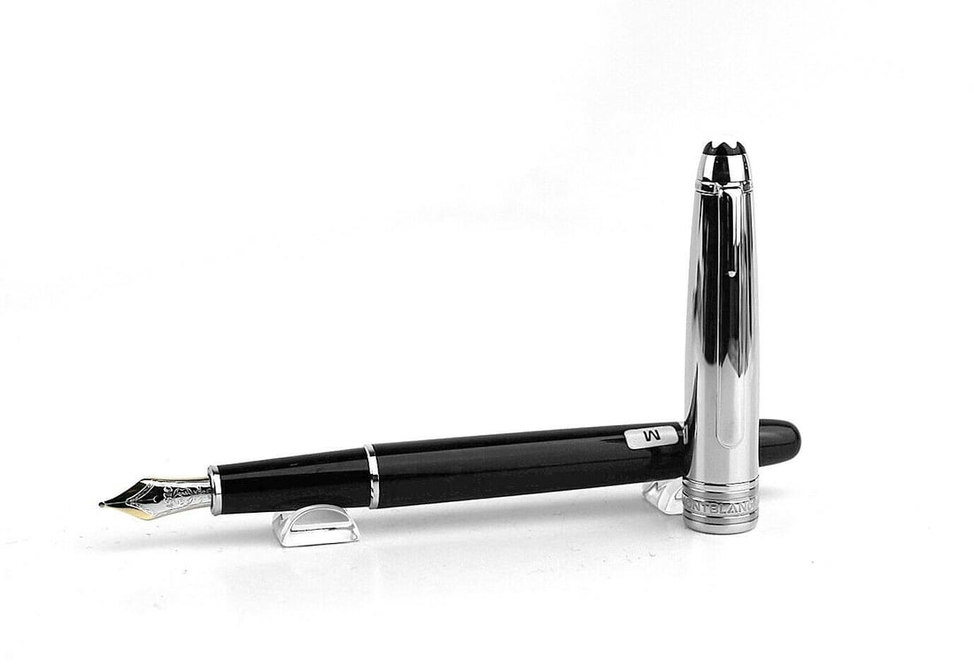 MONTBLANC MEISTERSTUCK 144 DOUE SOLITAIRE 18K GOLD NIB: MONTBLANCMEISTERSTUCK SOLITAIRESTAINLESS STEEL, PLATINUM PLATED100% AUTHENTIC & 100% BRAND NEW - GUARANTEEDMONTBLANC BOXMONTBLANC OUTER BOXNIB Size MIDENT: 5013This is a 144 PenNib: Hand-crafted 18K T