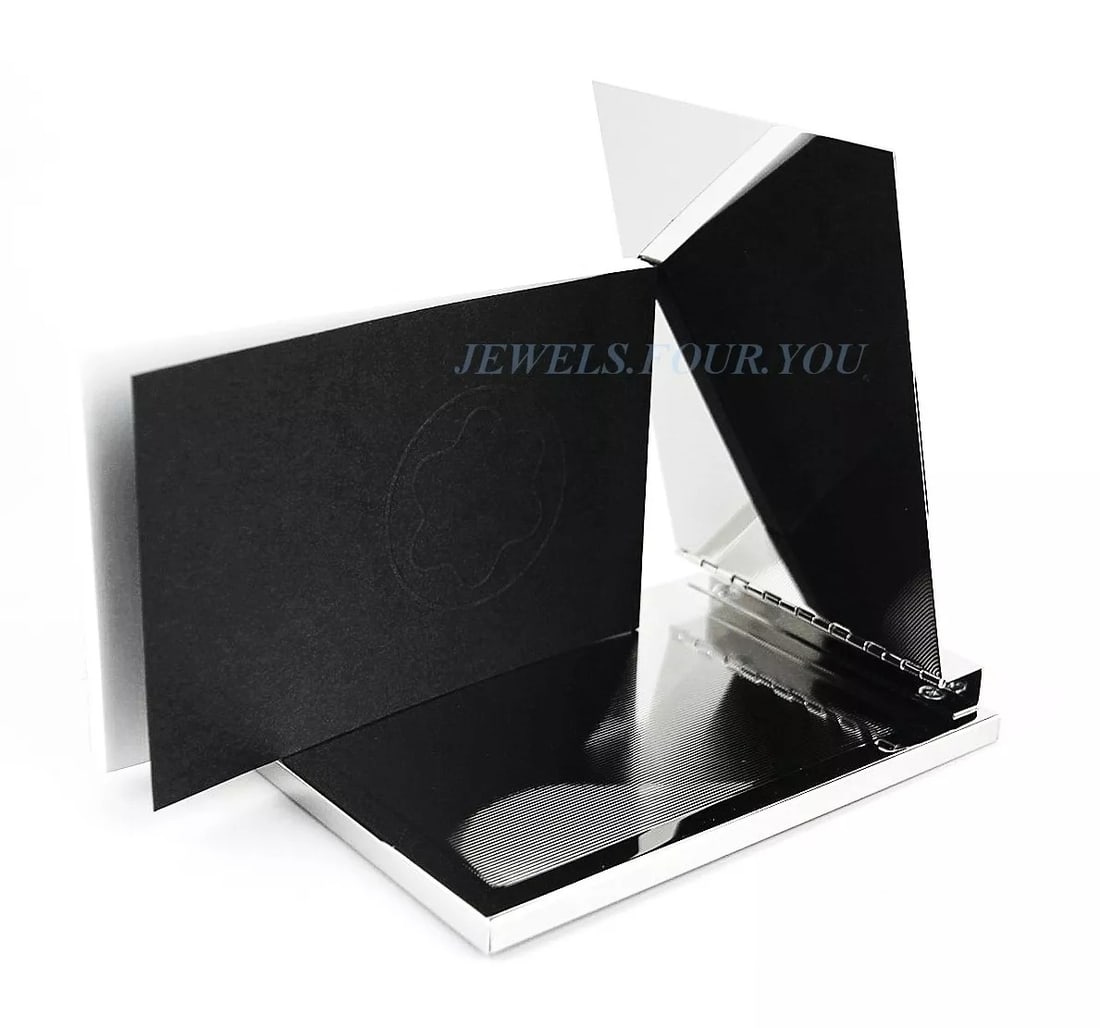 MONTBLANC DESKTOP MIRRORED STAINLESS STEEL MEMO PAD: MONTBLANCORIGINAL BOXMONTBLANC DESKTOP MEMO PAD100% AUTHENTIC 100% NEWMEISTERSTUCK COLLECTIONHighly polished to the MIRROR Quality STAINLESS STEEL (no glass there)MONTBLANC STAR ON THE COVERAdditional