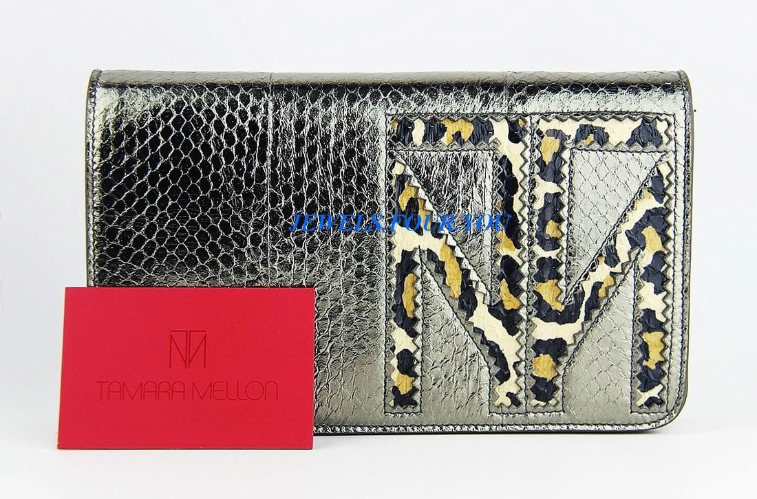 TAMARA MELLON CHIEF DESIGNER JIMMY CHOO TM ENJOY WATERSNAKE CLUTCH BAG ITALY: Tamara MellonTOP QUALITY 100% NAPPA LEATHERTM ENJOY WATERSNAKE CLUTCH BAGCompact and versatile, with monochromatic tm logo with pinking detail adds a subtle texture. It's the perfect evening bag. Pewt