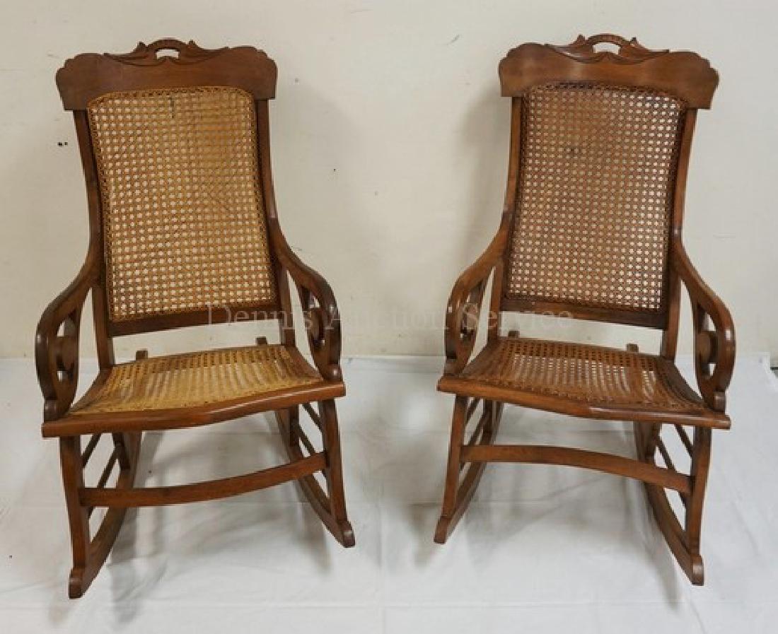 PAIR OF WALNUT ROCKING CHAIRS WITH CANED SEATS AND: PAIR OF WALNUT ROCKING CHAIRS WITH CANED SEATS AND BACKS. HIS & HERS.