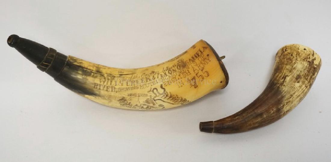 LOT OF 2 POWDER HORNS. ONE WITH SCRIMSHAW DECORATION: LOT OF 2 POWDER HORNS. ONE WITH SCRIMSHAW DECORATION AND SIGNED BY THE ARTIST *HORN BY PEET NO.52*. LONGEST IS 10 3/4 INCHES.