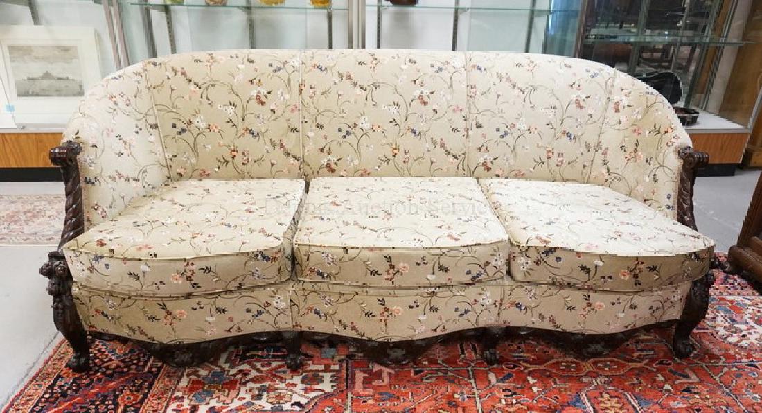 ORNATELY CARVED WALNUT SOFA WITH FLORAL UPHOLSTERY. 33 (1 of 3)