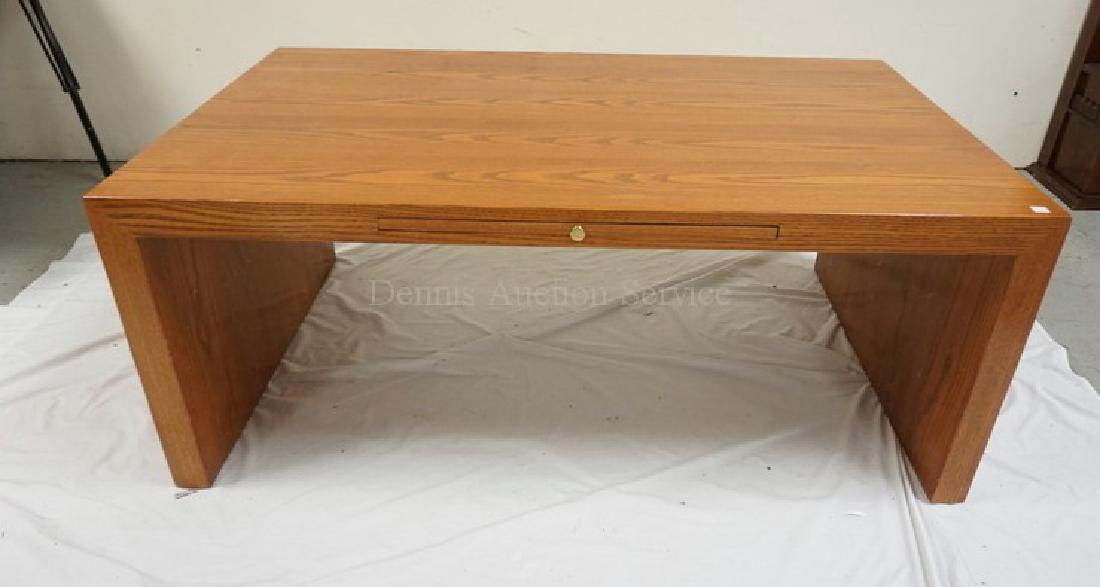 MODERN OAK TABLE. PULL OUT SURFACE. 50 X 30 INCH TOP. (1 of 2)