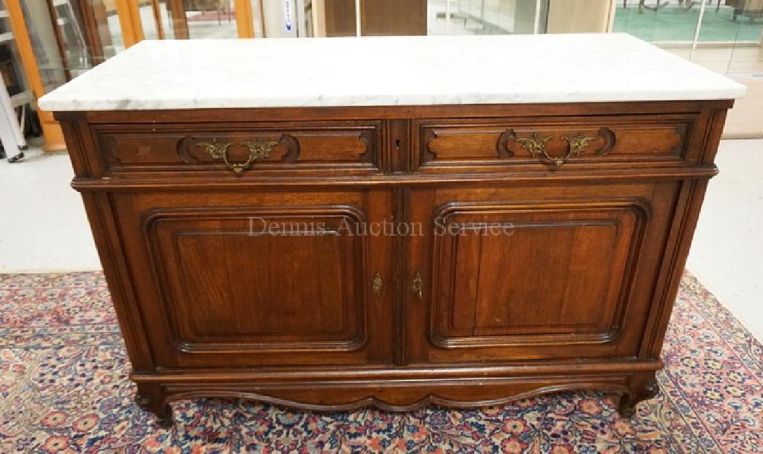CARVED WALNUT SIDEBOARD WITH A MARBLE TOP. PANELED (1 of 1)