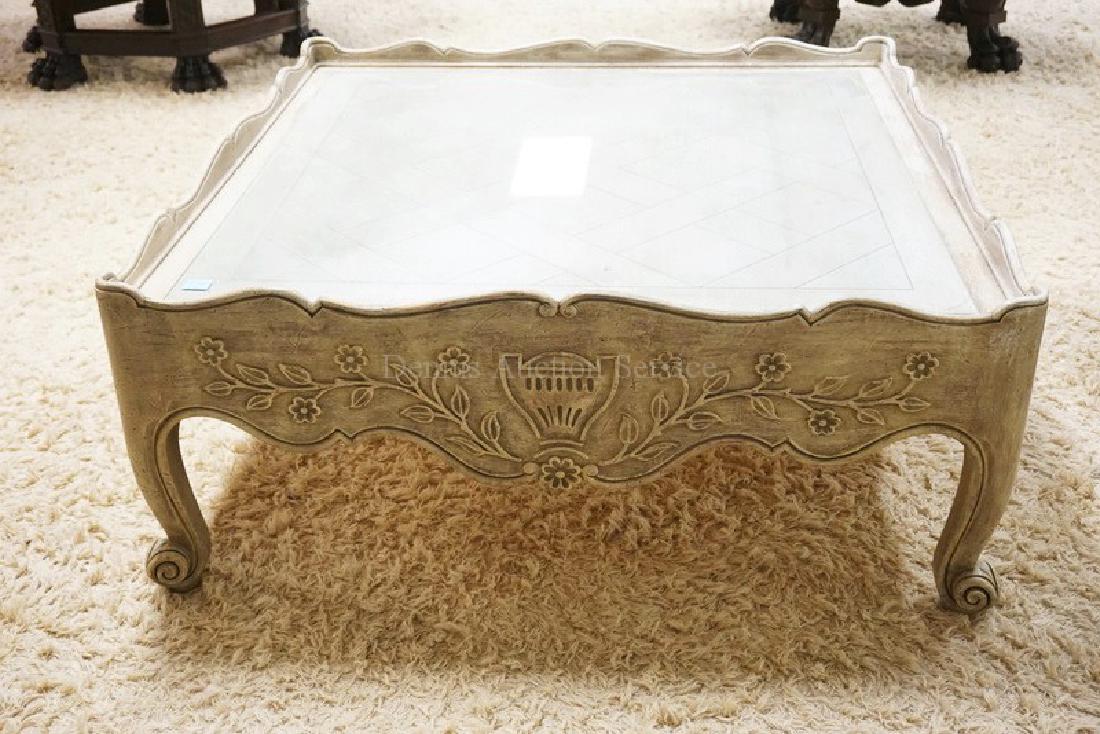 CARVED ASIAN STYLE COFFEE TABLE IN AN ANTIQUED WHITE: CARVED ASIAN STYLE COFFEE TABLE IN AN ANTIQUED WHITE FINISH. 42 INCHES SQUARE.