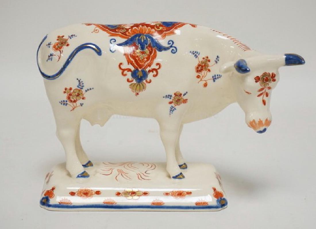 DELFT PORCELAIN FIGURE OF A COW. POLYCHROME DECORATED. (1 of 2)