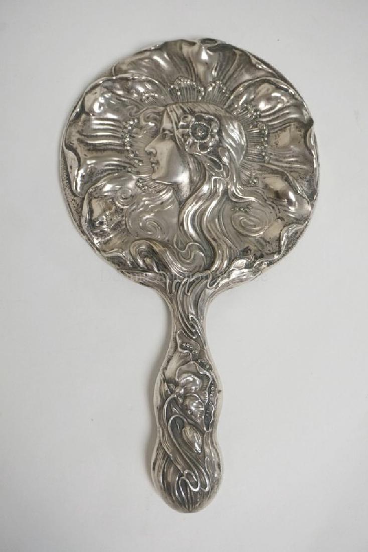 UNGER BROTHERS NOUVEAU STERLING SILVER HAND MIRROR9: UNGER BROTHERS NOUVEAU STERLING SILVER HAND MIRROR9 INCHES LONG. HAS SOME DENTS AROUND THE EDGE.