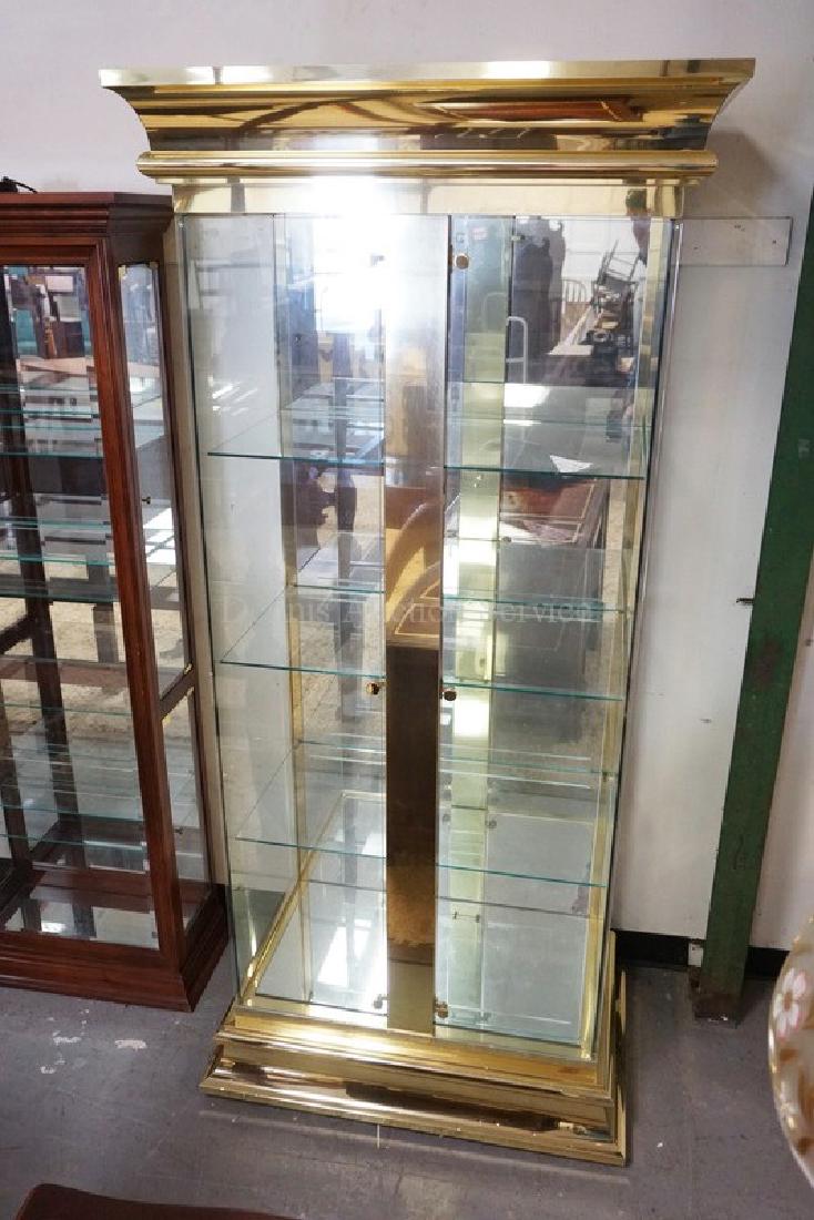 LARGE BRASS DISPLAY CABINET WITH A MIRRORED BACK AND (1 of 2)