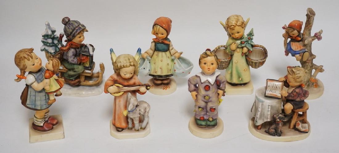 LOT OF 8 HUMMEL FIGURES. TALLEST IS 6 1/2 INCHES HIGH. (1 of 1)