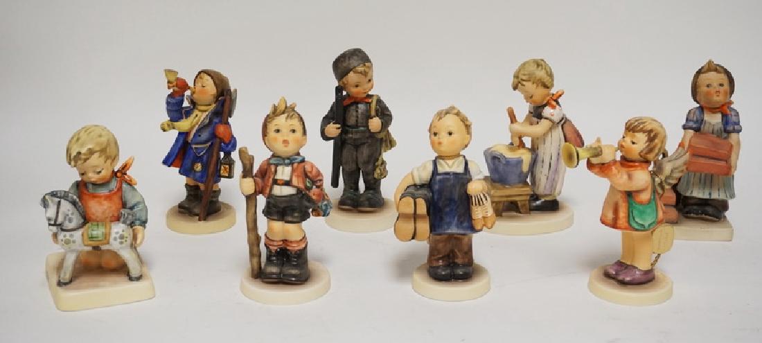 LOT OF 8 HUMMEL FIGURES. TALLEST IS 5 5/8 INCHES HIGH. (1 of 1)