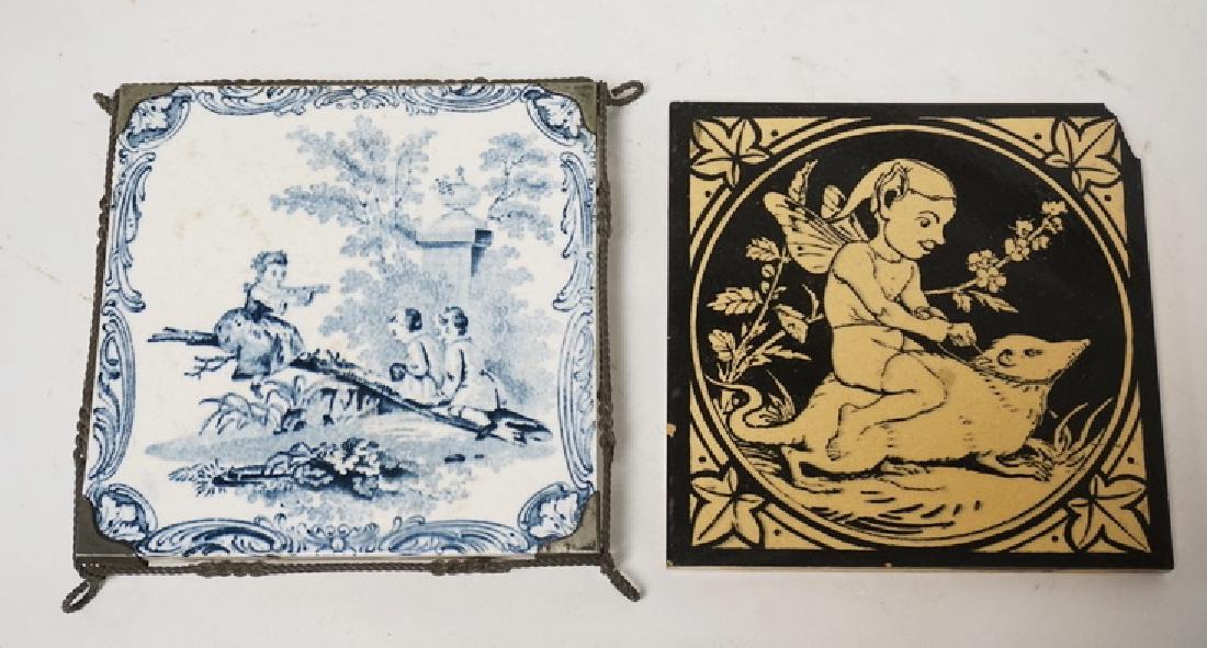 LOT OF 2 TILES. ONE IS MINTONS AND THE OTHER IS: LOT OF 2 TILES. ONE IS MINTONS AND THE OTHER IS CAMPBELL (HAS A CHIPED CORNER). EACH ARE 6 INCHES SQUARE.