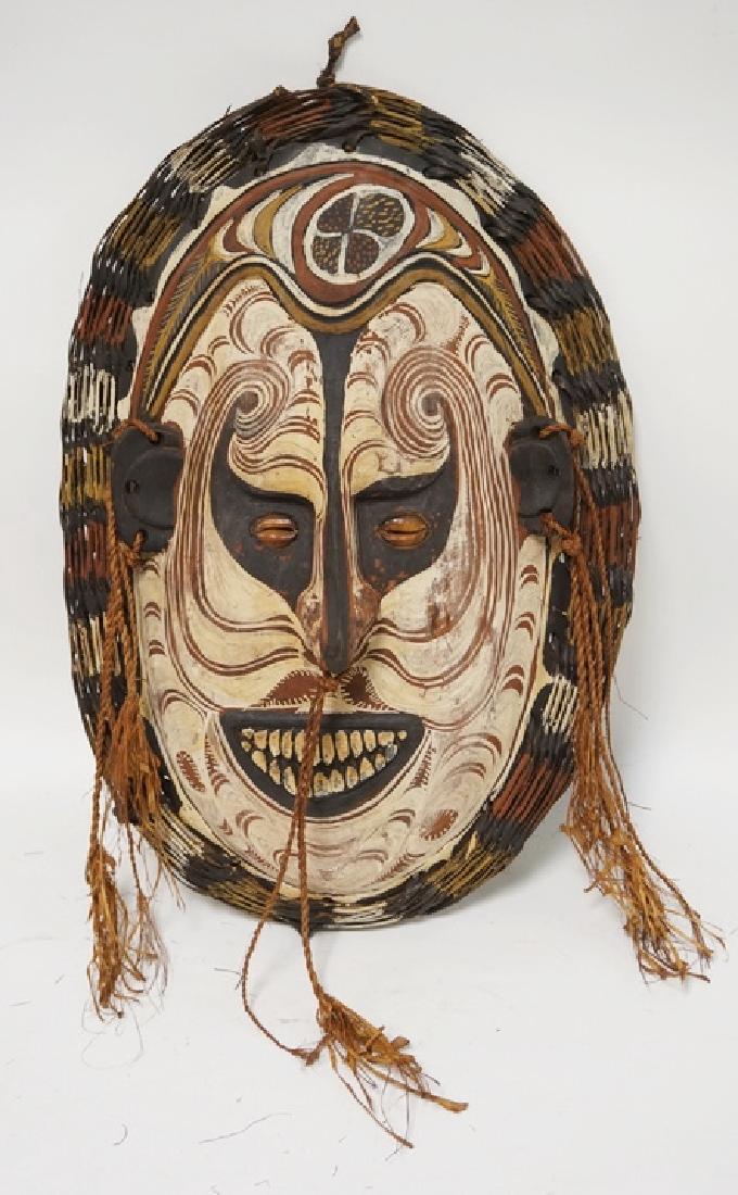 CARVED AFRICAN WALL HANGING WITH PAINTED DECORATION, A (1 of 1)