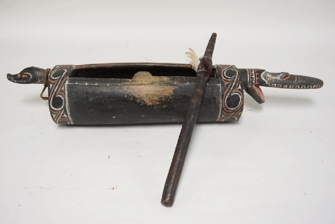 CARVED AND PAINTED AFRICAN TRIBAL INSTRUMENT. 28 3/4 (1 of 2)