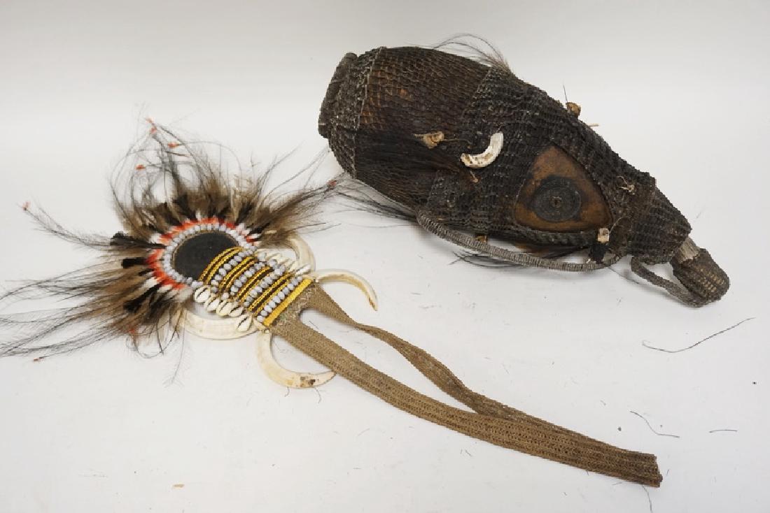 LOT OF 2 AFRICAN TRIBAL PIECES. A DECORATED GOURD: LOT OF 2 AFRICAN TRIBAL PIECES. A DECORATED GOURD BOTTLE AND A HANGING ITEM.