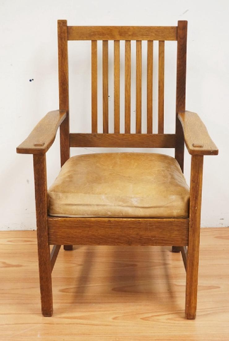 MISSION OAK ARMCHAIR. HAS A QUAINT STICKLEY METAL TAG.: MISSION OAK ARMCHAIR. HAS A QUAINT STICKLEY METAL TAG. 38 INCHES HIGH. 25 3/4 INCHES WIDE.