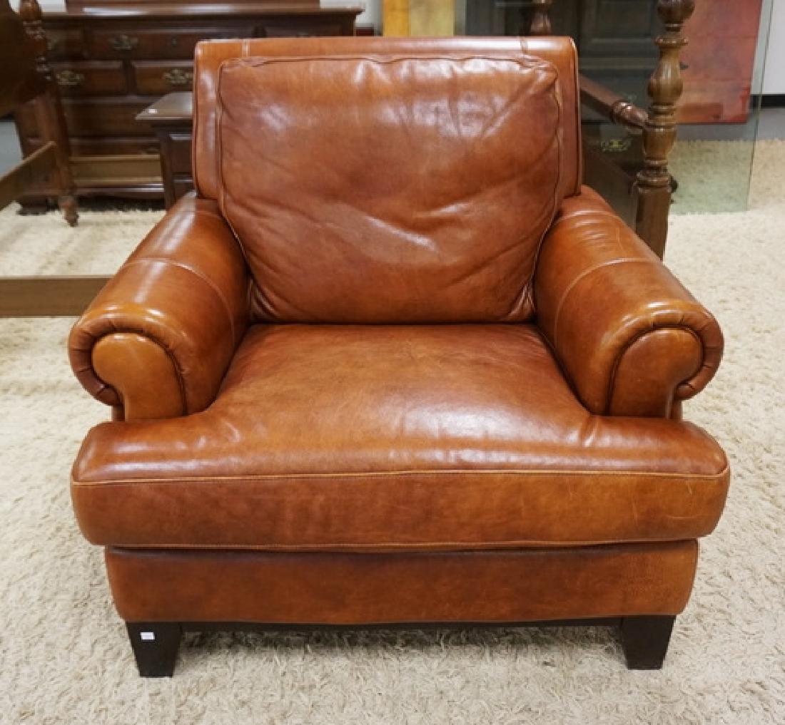BROWN LEATHER ARMCHAIR BY CRATE & BARREL. (1 of 2)