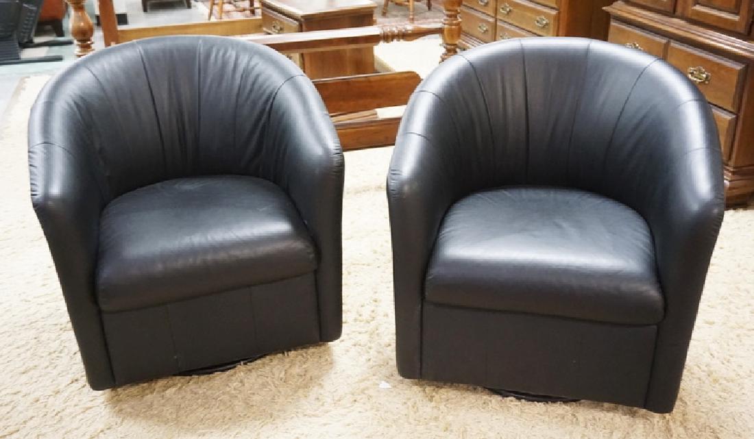 PAIR OF NATUZZI LEATHER CLUB CHAIRS. (1 of 1)