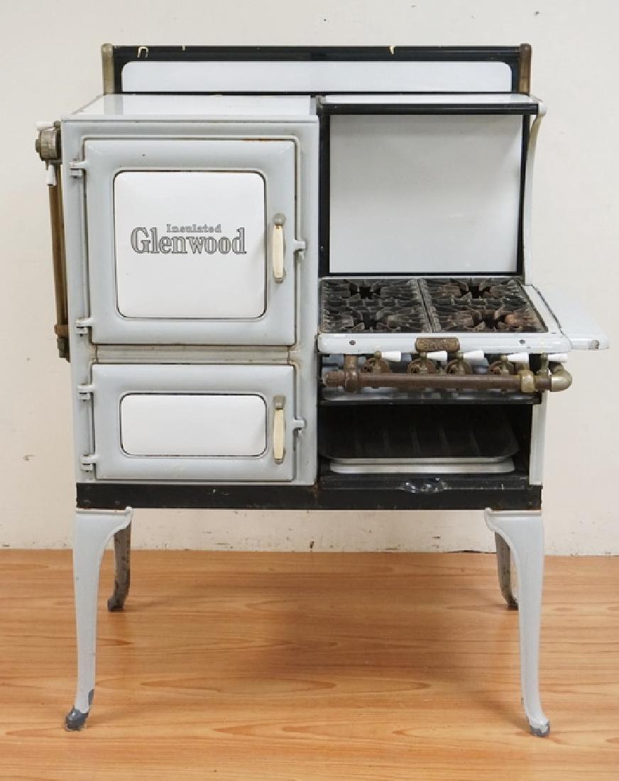 VINTAGE GLENWOOD PORCELAIN ENAMEL GAS STOVE. 53 INCHES