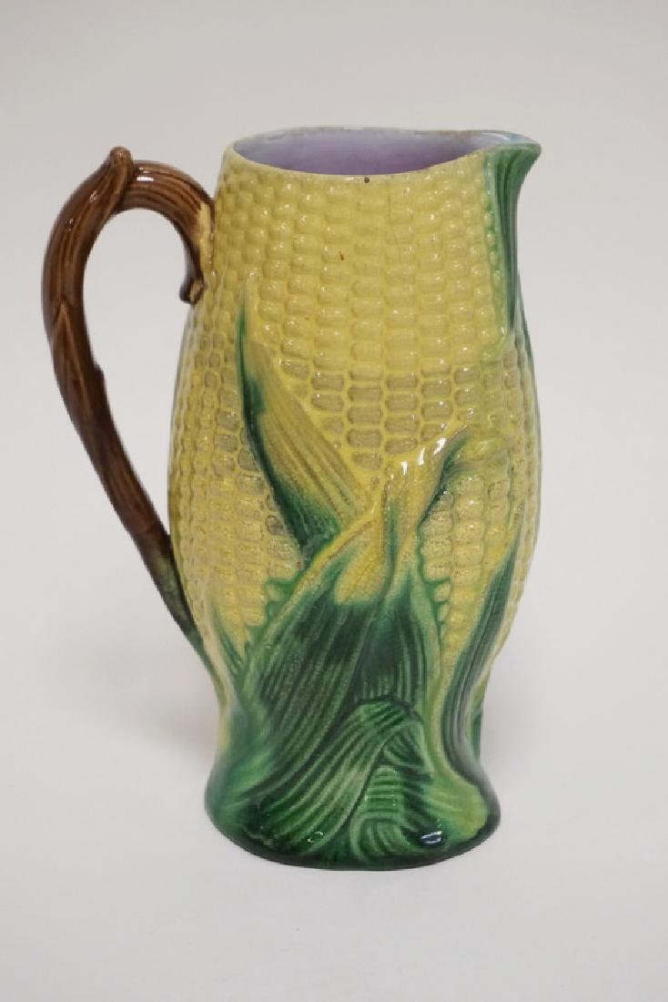 ANTIQUE MAJOLICA CORN PITCHER WITH A LAVENDER INTERIOR. (1 of 3)