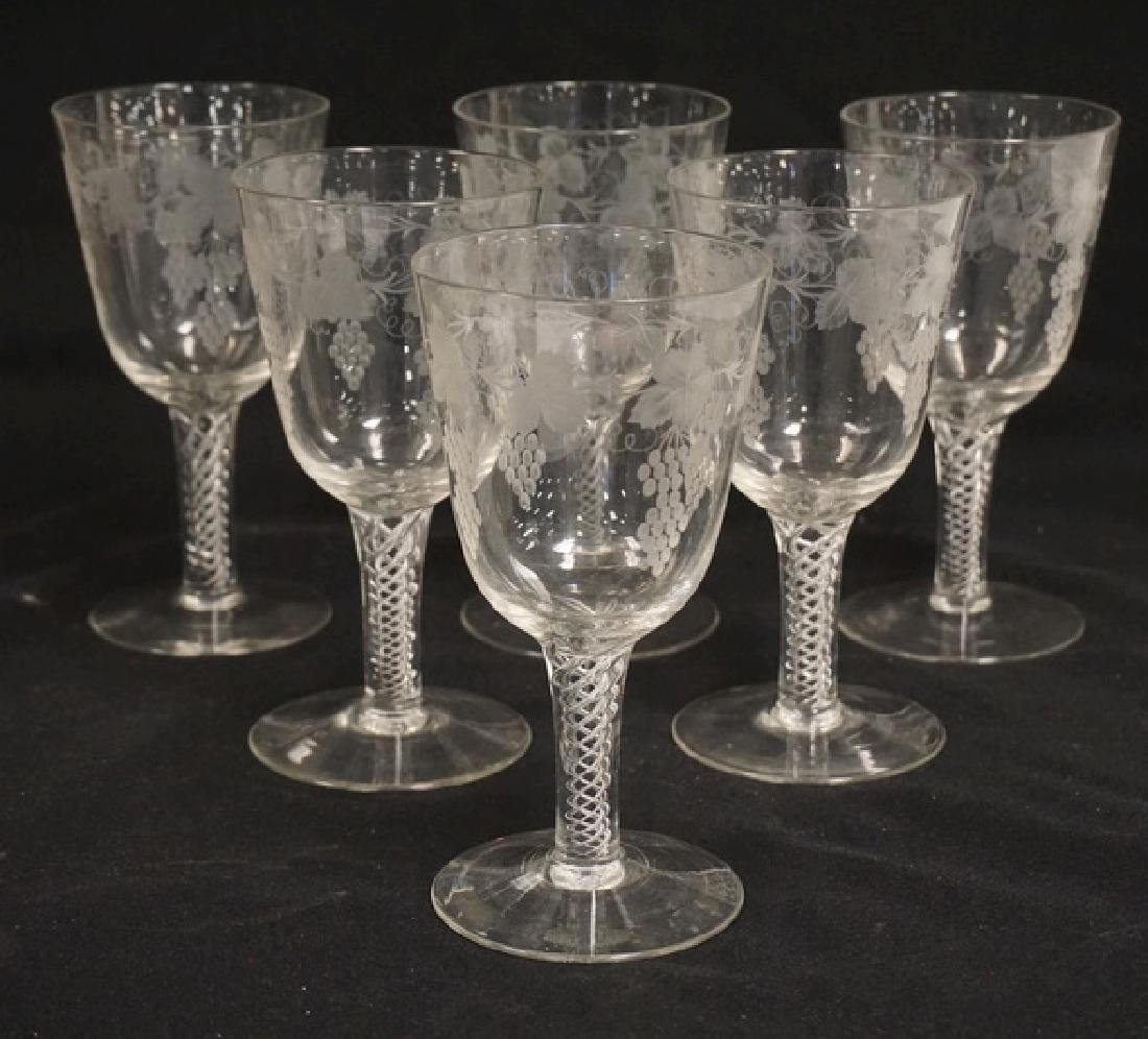 SET OF 6 CRYSTAL GOBLETS WITH HELIX TRAPPED AIR STEMS: SET OF 6 CRYSTAL GOBLETS WITH HELIX TRAPPED AIR STEMS AND VERY FINELY ENGRAVED SIDES WITH GRAPES & LEAVES.