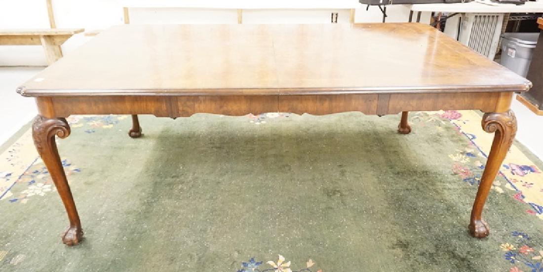 BANDED DINING TABLE WITH BALL & CLAW CABRIOLE LEGS.: BANDED DINING TABLE WITH BALL & CLAW CABRIOLE LEGS. BURLED TOP. FINISH AND VENEER WEAR. 4 FT X 6 FT 6 INCHES.