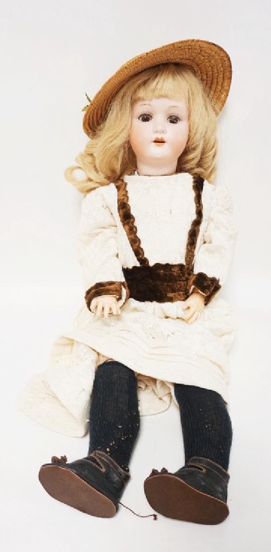 HEUBACH BISQUE HEAD DOLL. 23 IN (1 of 2)