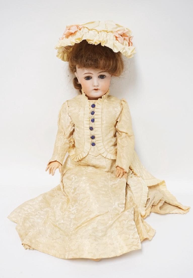 GERMAN BISQUE HEAD DOLL. 22 INCHES LONG. (1 of 4)