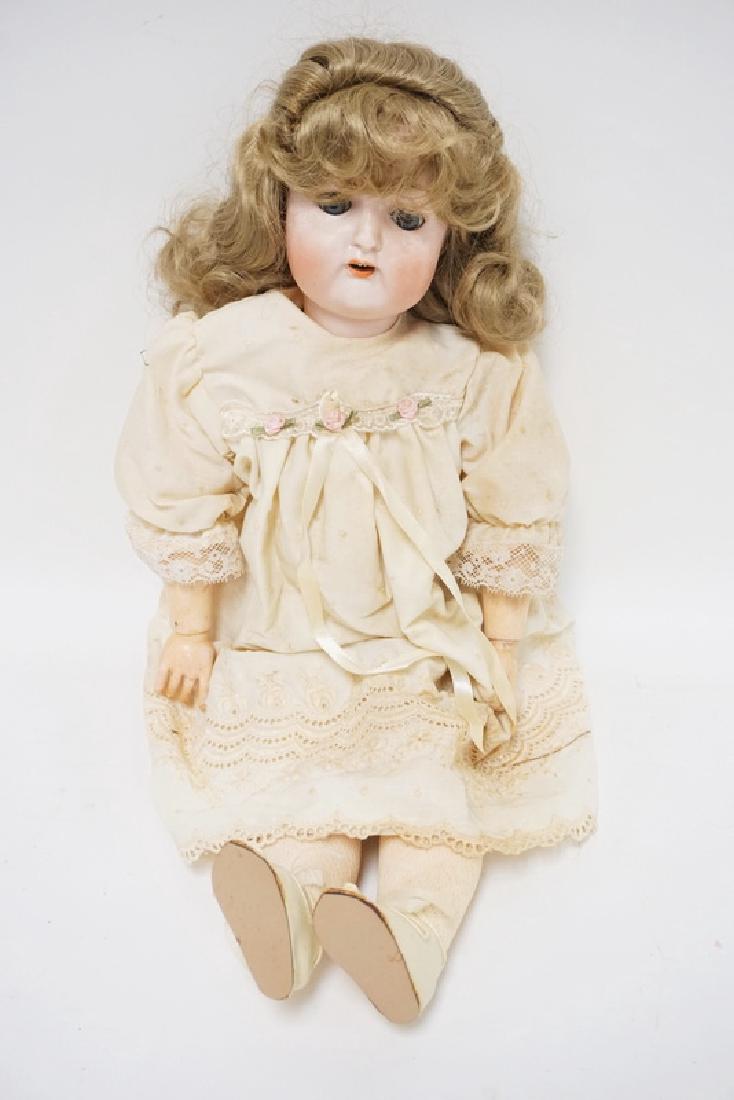 NIPPON BISQUE HEAD DOLL MEASURING 22 INCHES LONG. (1 of 4)
