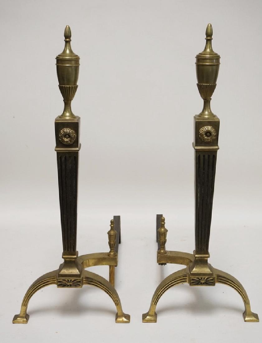 PAIR OF BRASS ANDIRONS WITH FLUTED SQUARE COLUMNSAND: PAIR OF BRASS ANDIRONS WITH FLUTED SQUARE COLUMNSAND URN FINIALS. 24 3/4 INCHES HIGH.