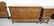 4 PIECE CARVED WALNUT BEDROOM SET. HAS WEAR. - 4