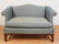 UPHOLSTERED SETTEE WITH CHIPPENDALE LEGS. 57 INCHES