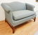 UPHOLSTERED SETTEE WITH CHIPPENDALE LEGS. 57 INCHES - 2