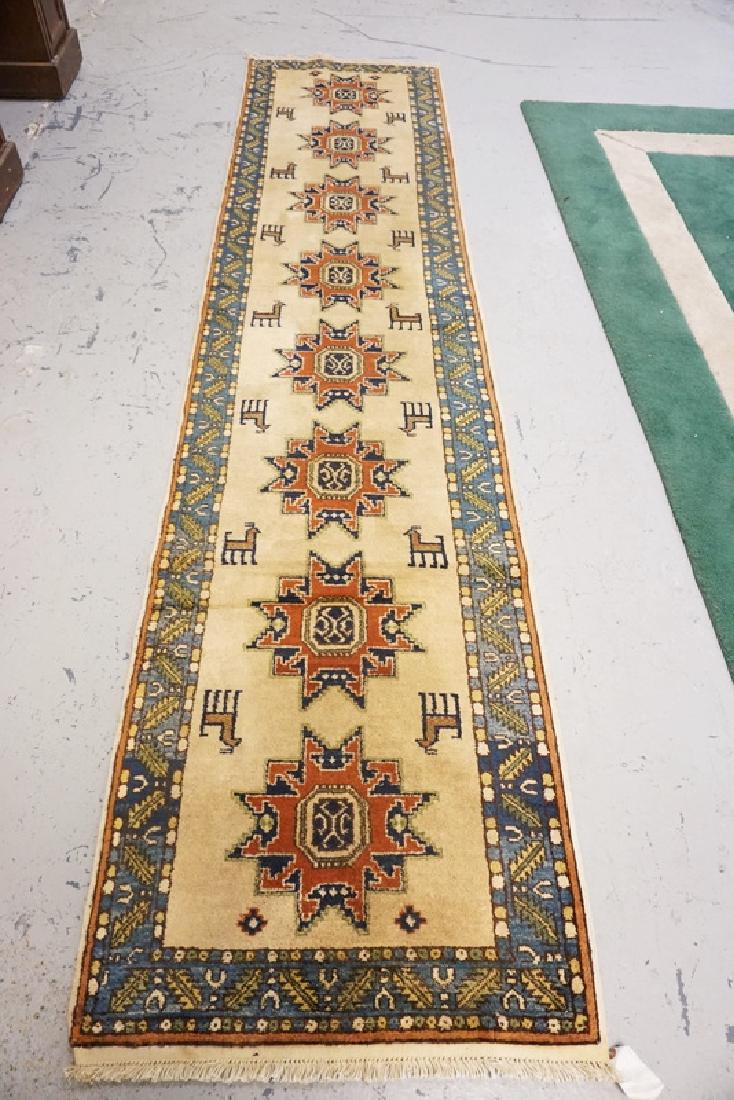 ORIENTAL RUNNER MEASURING 10 FT 7 X 2 FT 5 INCHES. (1 of 1)