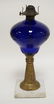 COBALT BLUE GLASS OIL LAMP WITH A CUT BACK DESIGN OF