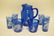 8 PIECE COBALT BLUE GLASSWARE DECORATED WITH SAILBOATS