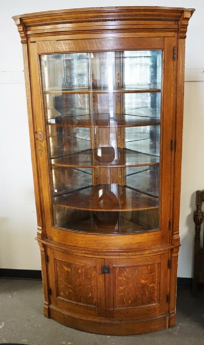 OAK BUILT-IN CORNER CABINET WITH A BOWED GLASS DOOR AND (1 of 2)