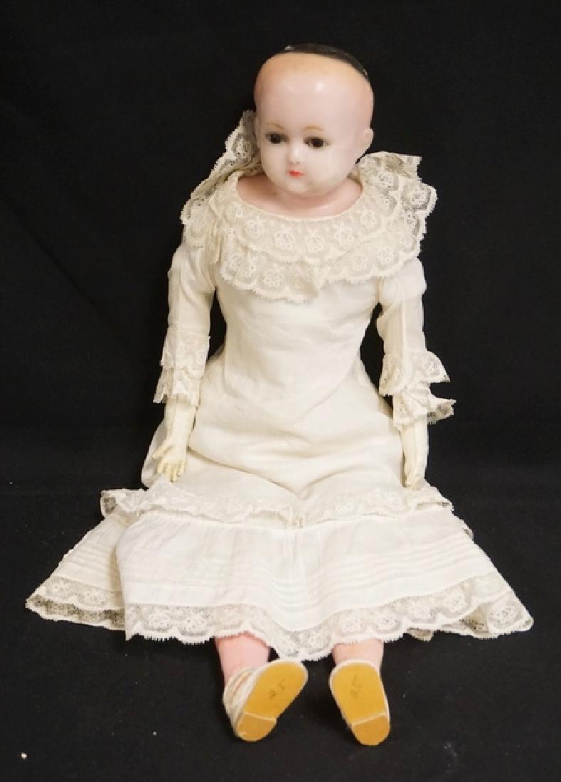 ANTIQUE WAX DOLL. 21 INCHES LONG. (1 of 2)