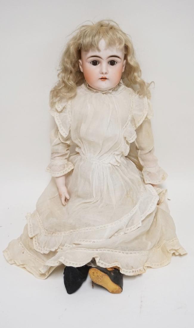 BISQUE HEADED DOLL MEASURING 22 INCHES HIGH. IMPRESSED (1 of 4)