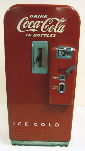 10 CENT COKE BOTTLE MACHINE: 10 CENT COKE BOTTLE MACHINE; 59 IN HIGH, 27 IN WIDE & 21 IN DEEP; MODEL #F39B50 K, SERIAL #F105 36832; VENDO COMPANY, KANSAS CITY, MO