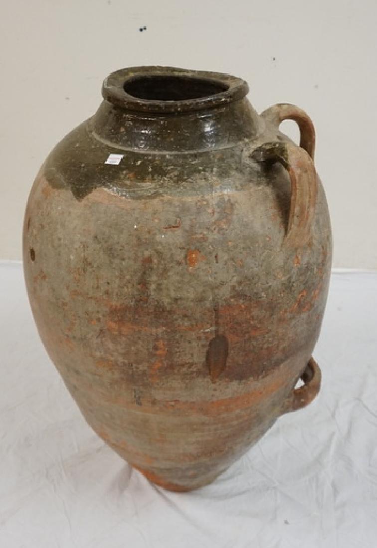 LARGE RED POTTERY FLOOR URN WITH 2 APPLIED HANDLES. (1 of 1)