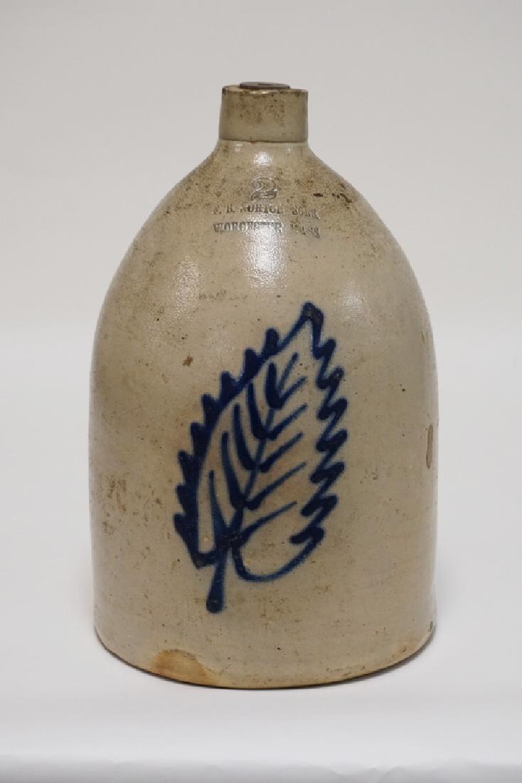 STONEWARE JUG WITH A BLUE LEAF DECORATION. 2 GALLON. (1 of 3)