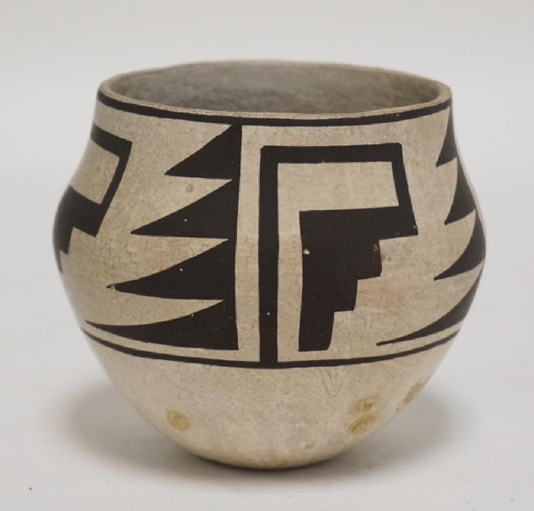 ACOMA POTTERY VESSEL BY J. GARCIA. 3 1/2 INCHES HIGH. (1 of 2)