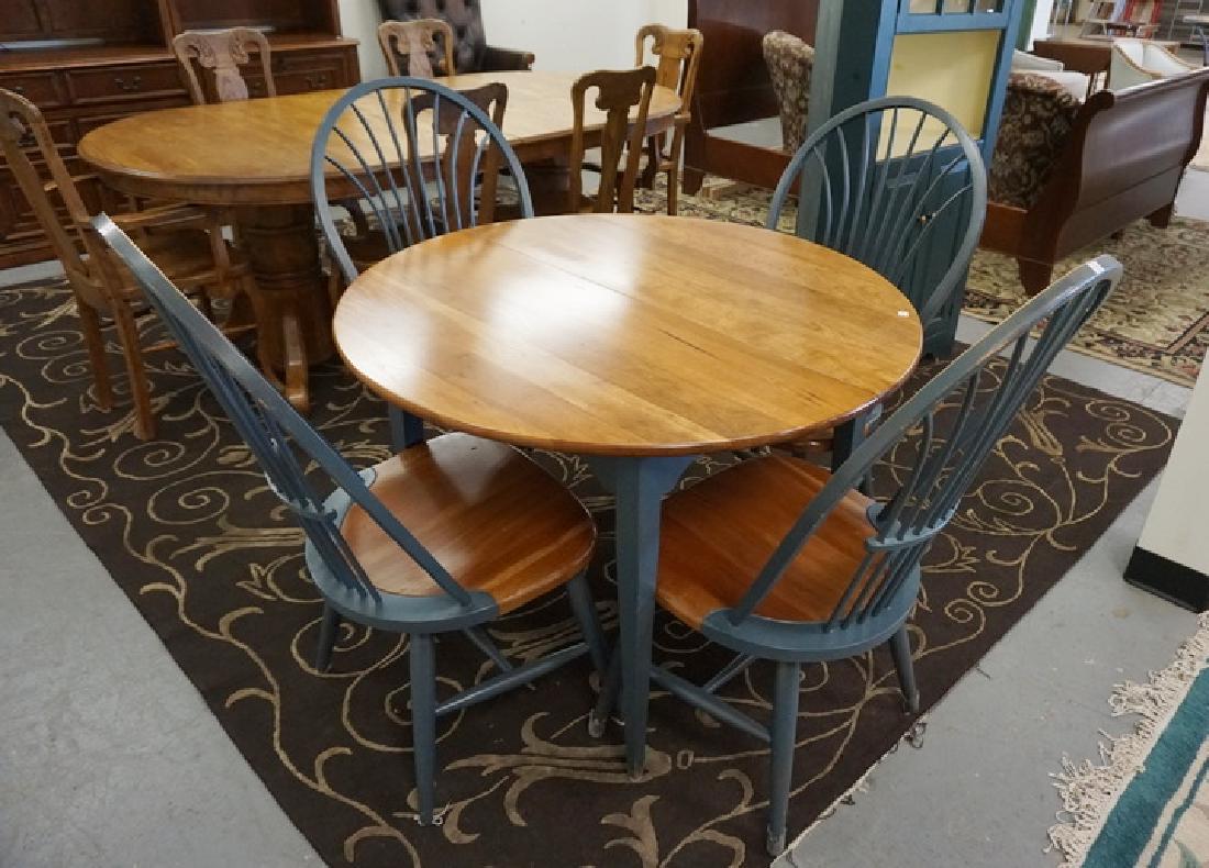 DINETTE TABLE AND 4 CHAIRS. ONE 18 IN LEAF. 42 IN DIA (1 of 1)