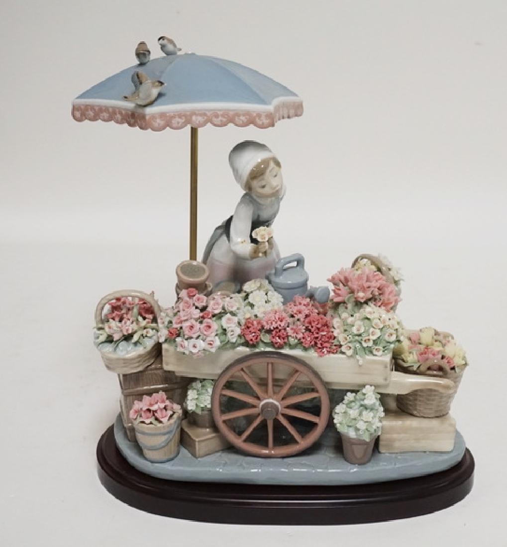 LLADRO PORCELAIN SCULPTURE OF A WOMAN WITH A FLOWER (1 of 5)
