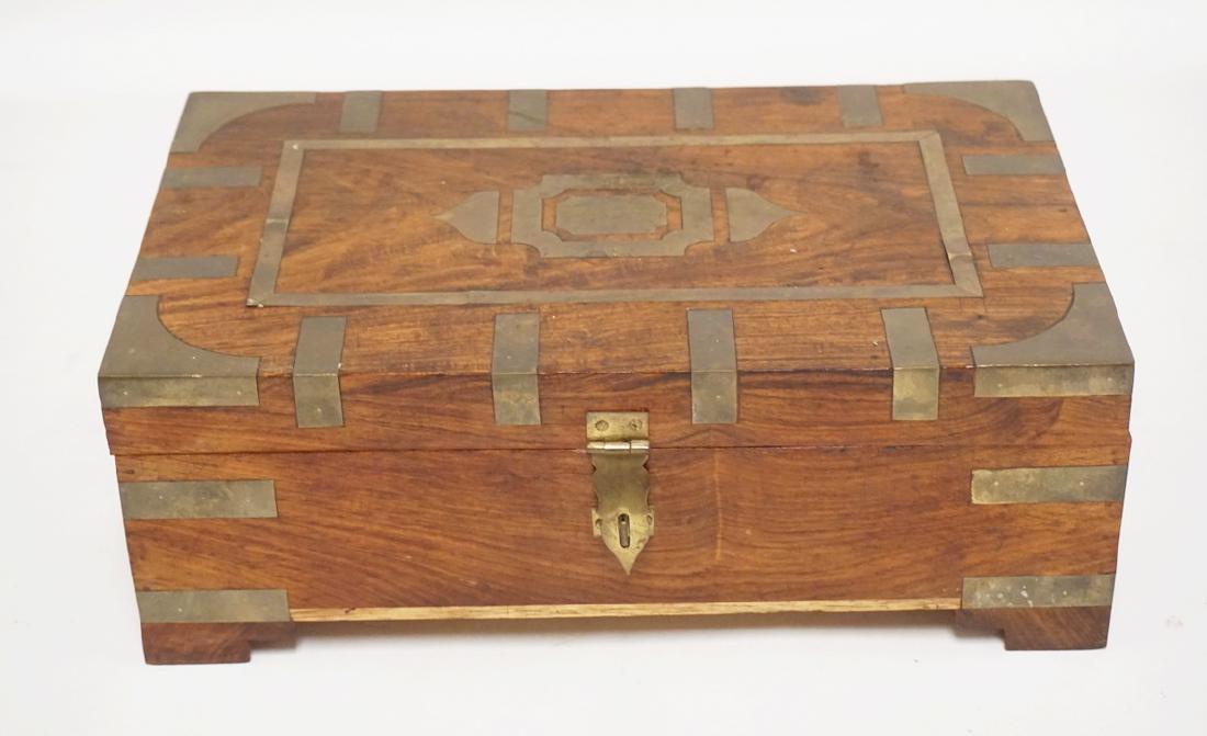 BRASS BOUND WOODEN BOX WITH A COMPARTMENTED INTERIOR. (1 of 3)