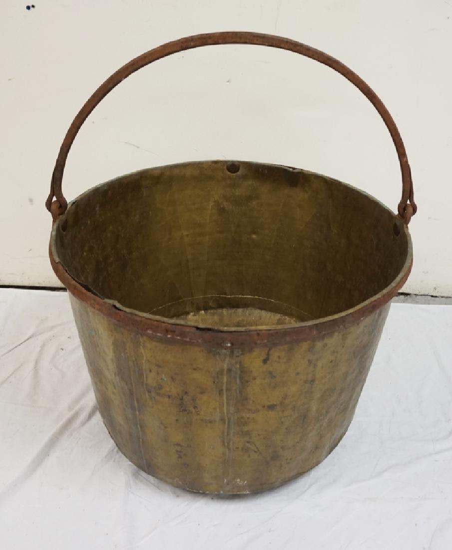 LARGE BRASS KETTLE WITH WROUGHT IRON HANDLE. HAS AN OLD (1 of 1)