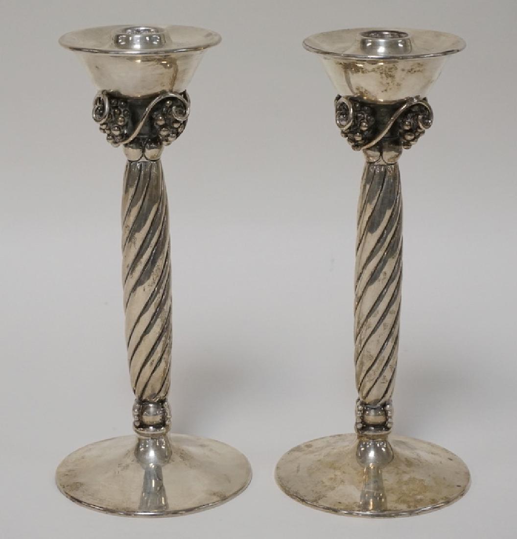 PAIR OF STERLING SILVER CANDLESTICKS IN THE MANNER OF (1 of 3)